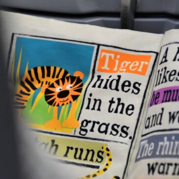 tiger hides in the grass paper